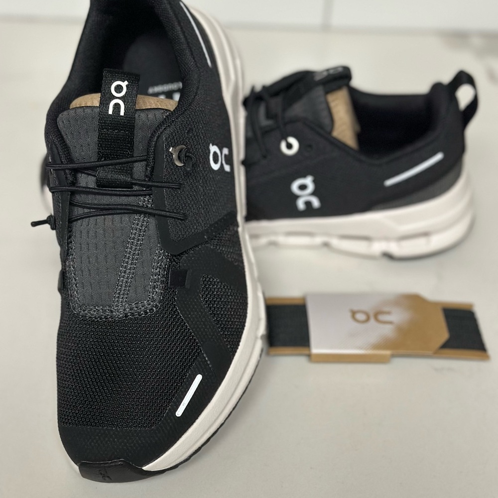 New still in box never worn On Running  shoes  Kids Black and White Sneakers